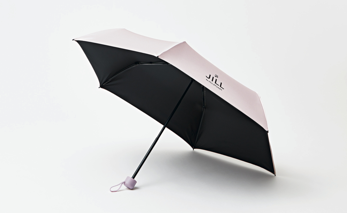 スウィート2026年5月号増刊号付録の、ジル バイ ジルスチュアートの折り畳み傘を開いたところ。遮光率99.5％以上、紫外線遮蔽率99.9％以上と非常にハイスペックな傘生地の性能。