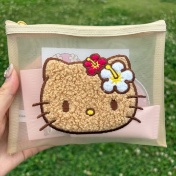 日焼け ハローキティ　メッシュポーチ