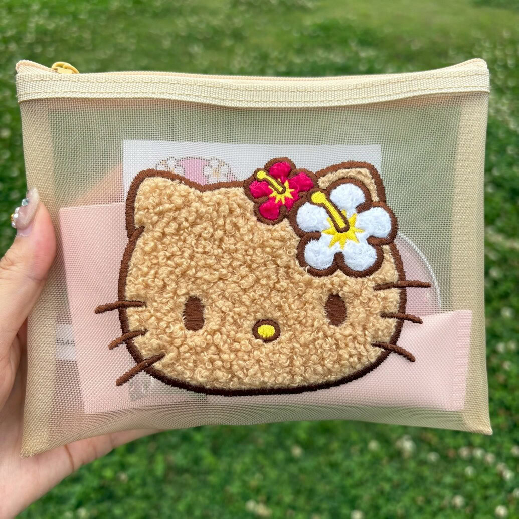 日焼け ハローキティ　メッシュポーチ