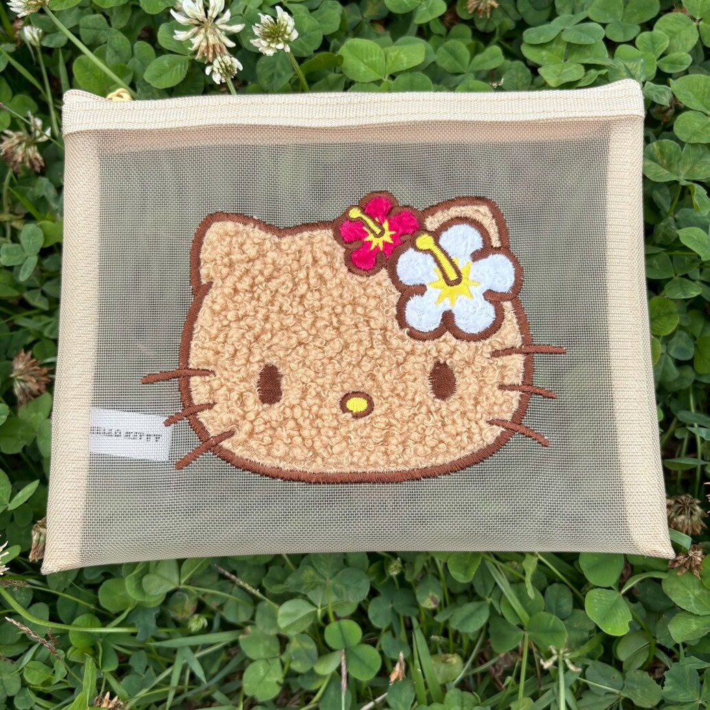 日焼け ハローキティ　メッシュポーチ
